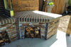 Outdoor Stone Kitchen With Firebrick Pizza Oven and Large Rotisserie bbq